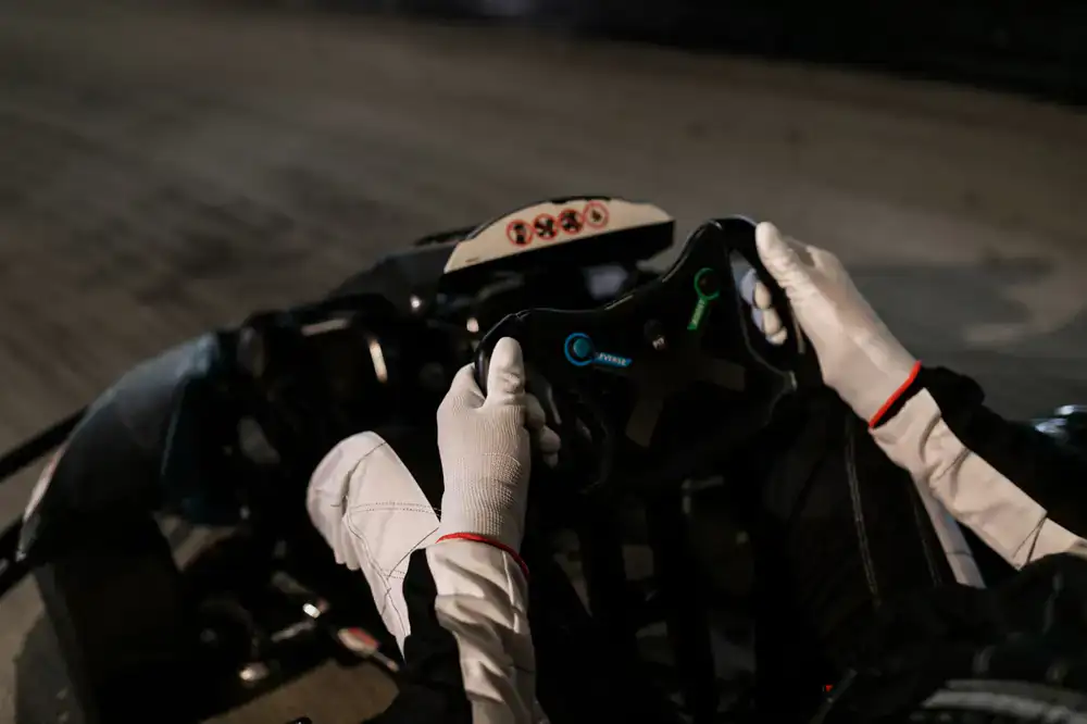 Close up of a modern electric go-kart steering wheel and digital dash