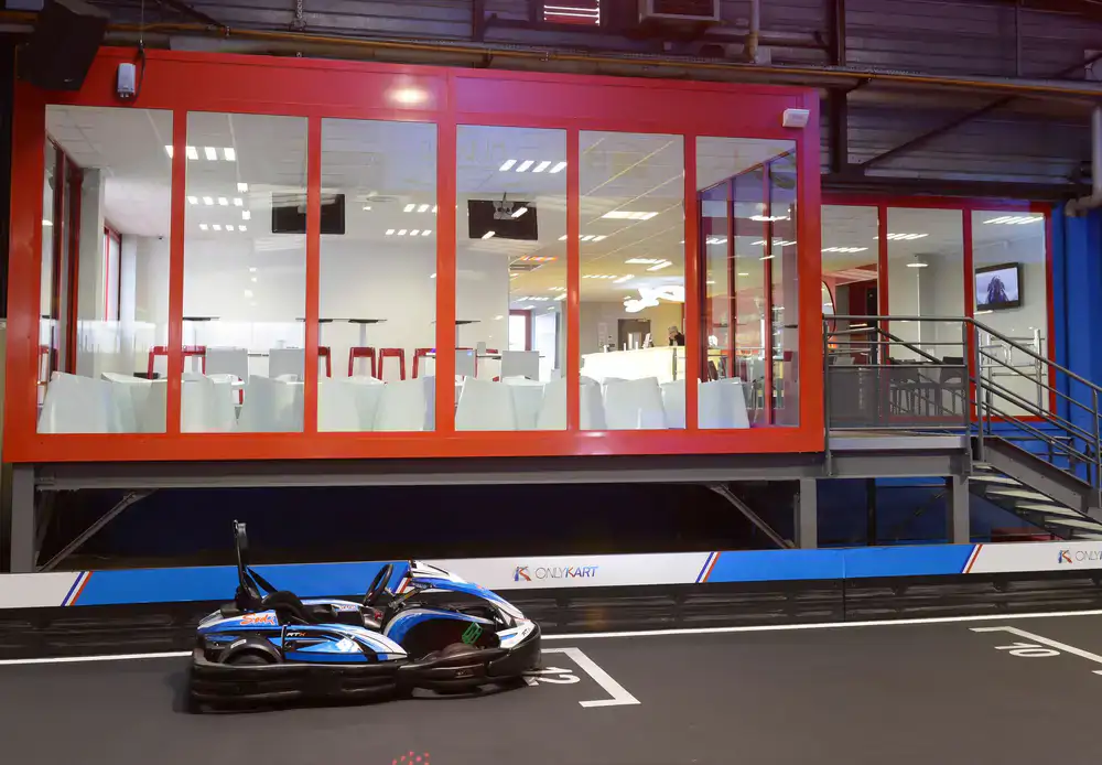 Birthday party gathering next to electric karts